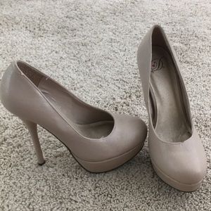 Nude closed toed heels